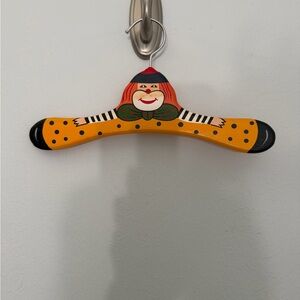 2 Hand-Painted Novelty Wooden Hangers with Clown Motif - Yellow & Green